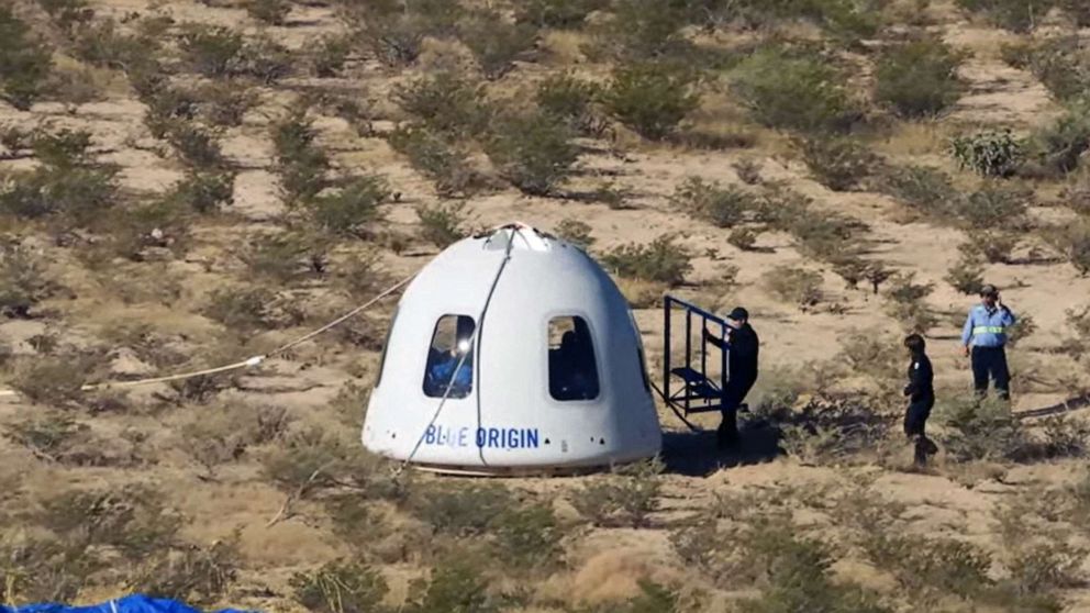 PHOTO: Recovery crews reach the New Shepard NS-18 mission capsule after landing on Oct. 13, 2021, in the West Texas region, 25 miles north of Van Horn.
