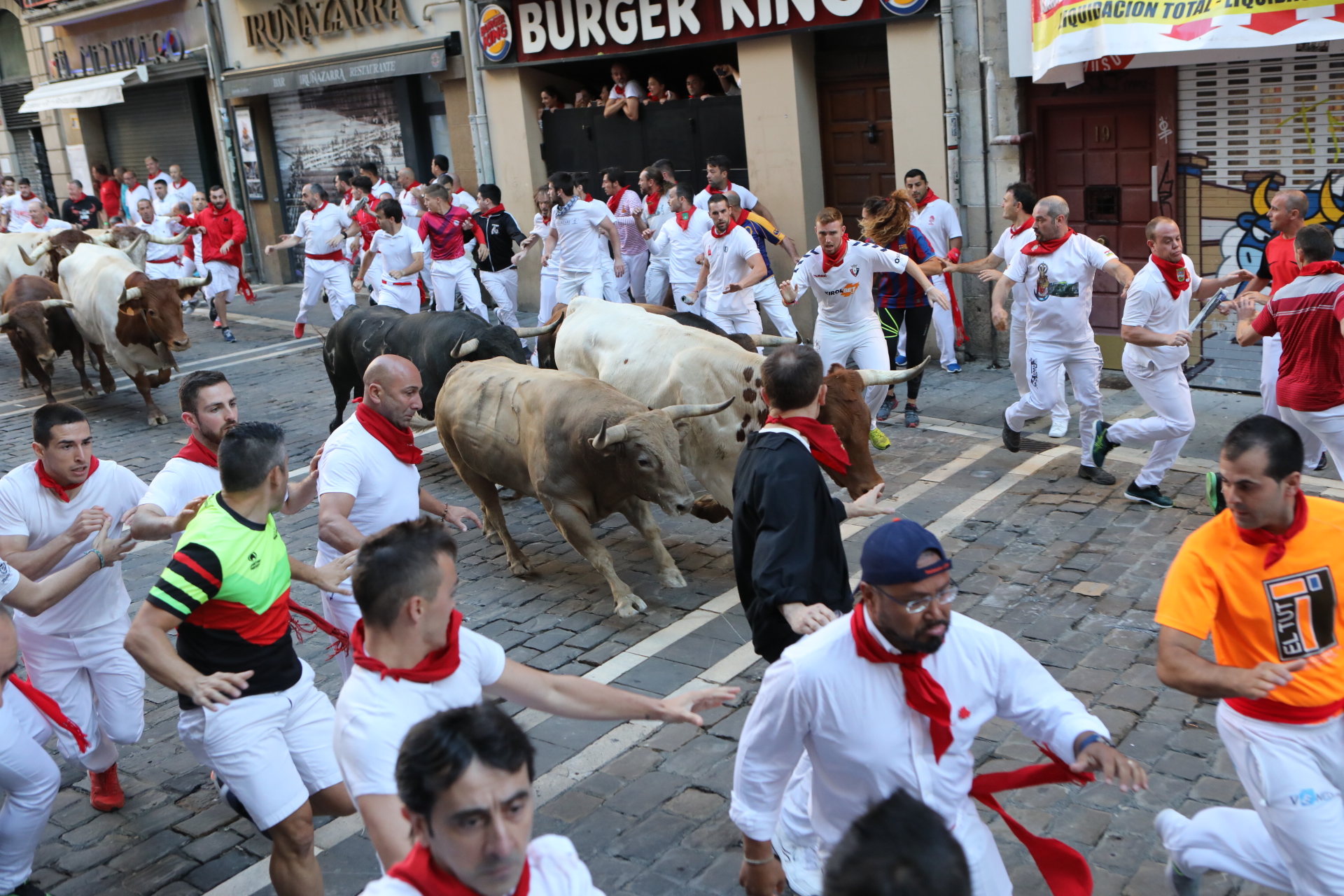 PHOTO: People are seen running during the running of the bulls, July 12, 2019,
in Pamplona, Spain. 