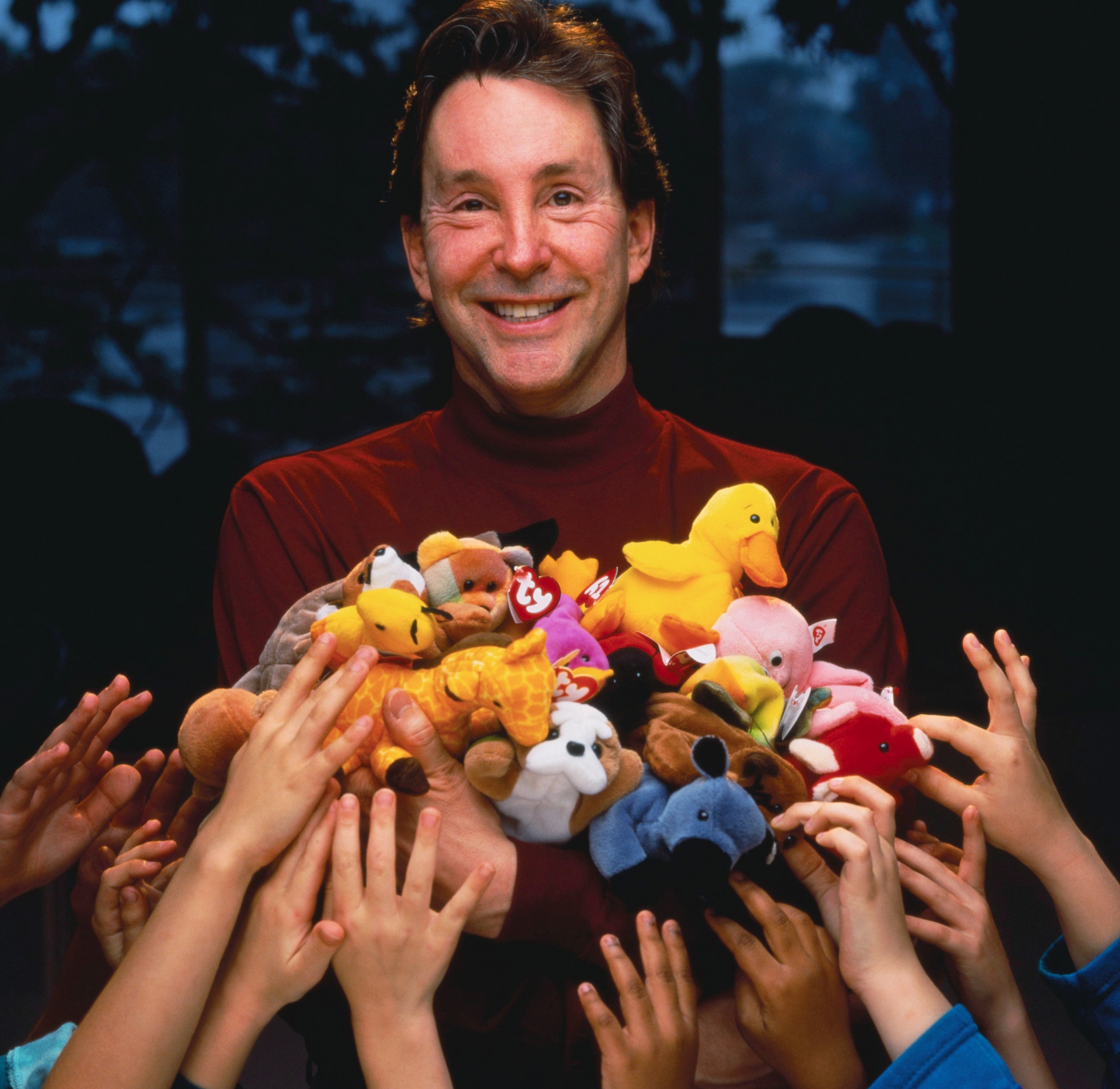 PHOTO: Ty Inc. founder Ty Warner holds a bunch of Beanie Babies in an undated photo.
