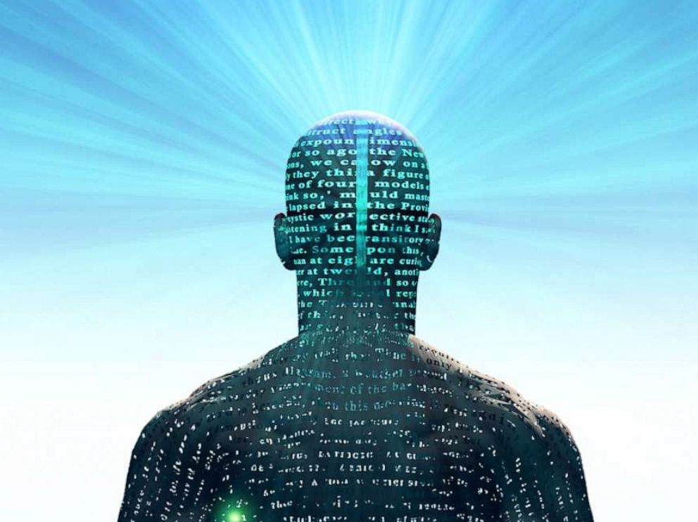 PHOTO: An illustration shows a figure covered in digital text with light radiating from mind.