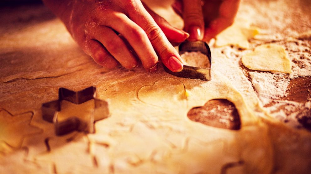 PHOTO: Cookie cutters are used to shape dough by a baker in an undated stock image.