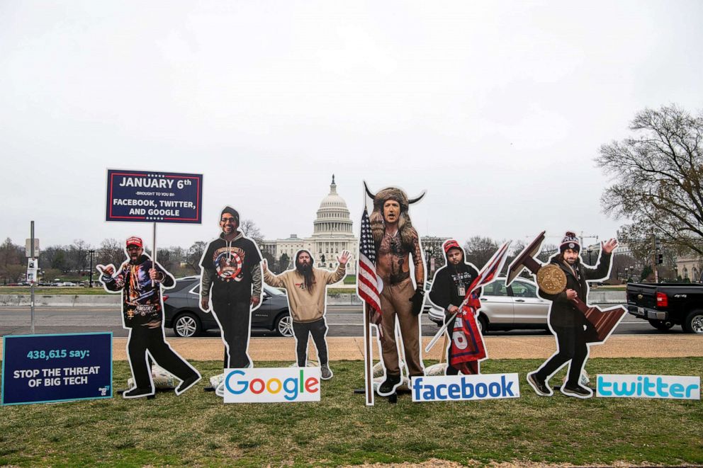 PHOTO:  A cutout of Mark Zuckerberg, CEO of Facebook, dressed up as the QAnon Shaman stands with other Capitol rioter images before joint hearing on  Social Media's Role in Promoting Extremism and Misinformation in Washington, March 25, 2021. 
