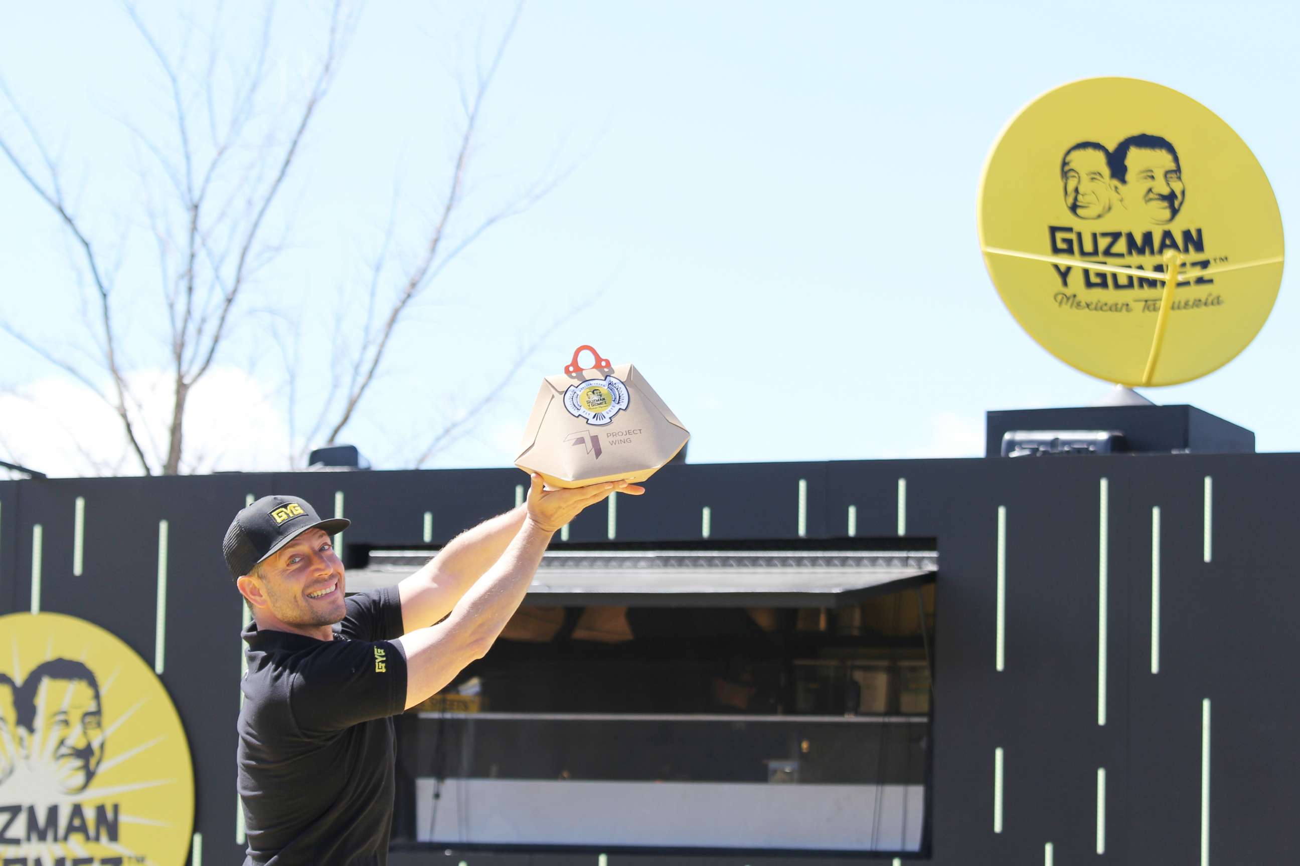 PHOTO: Founder and Global CEO of Guzman y Gomez Steven Marks sends off food delivery with the drone in this undated photo.