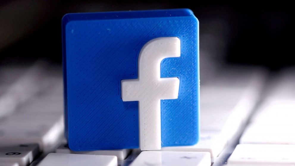 PHOTO: A 3D-printed Facebook logo is seen placed on a keyboard in this illustration taken March 25, 2020.