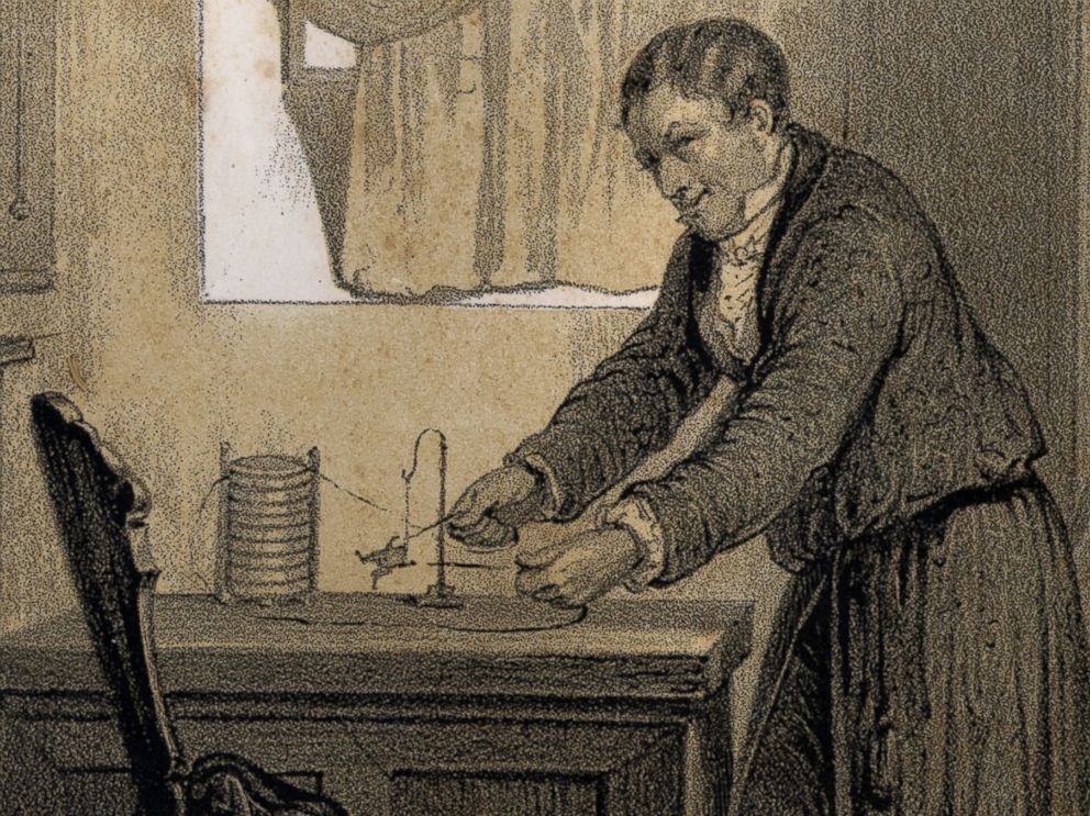 PHOTO: A 19th century engraving depicts Alessandro Volta and his electric battery.