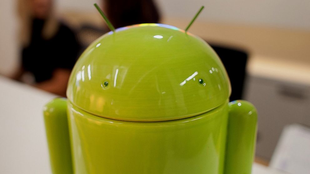 The Google Inc. Android character stands at the front desk during a media tour for the grand opening of Google Inc.'s new office in Toronto, Canada, Nov. 13, 2012. 