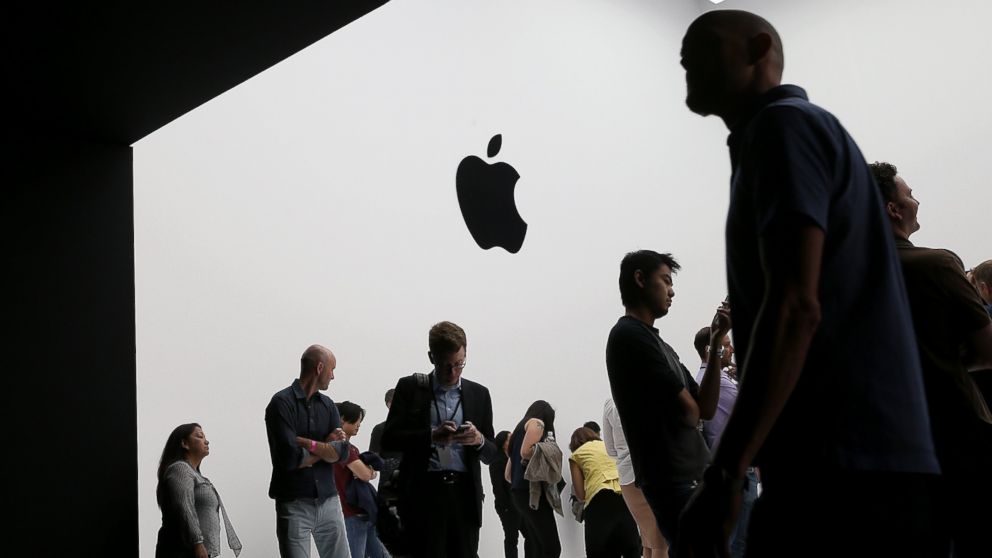 Attendees gather during an Apple special event at the Flint Center for the Performing Arts, Sept. 9, 2014 in Cupertino, California. 