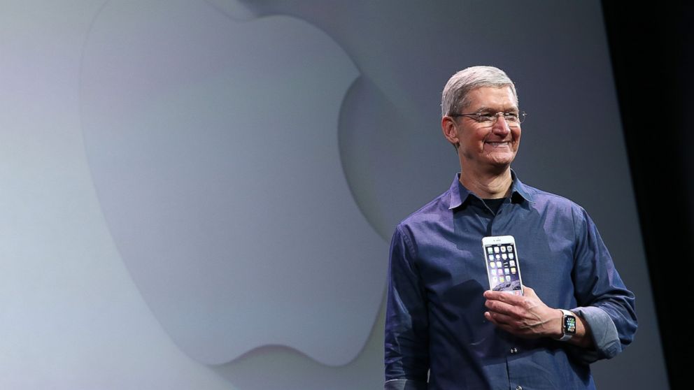 PHOTO: Tim Cook shows off the new iPhone 6 and the Apple Watch during an Apple special event at the Flint Center for the Performing Arts on Sept. 9, 2014 in Cupertino, California.