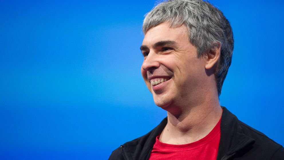 Larry Page, co-founder and chief executive officer at Google Inc., smiles during the Google I/O Annual Developers Conference in San Francisco, California, May 15, 2013. 