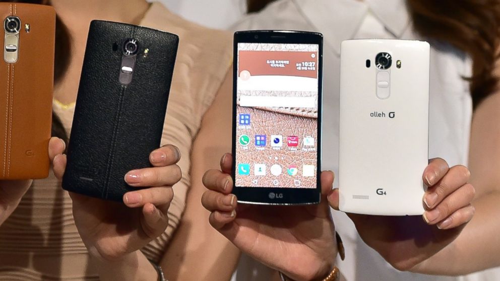 Models show LG Electronics' new smartphone G4 during its launch event in Seoul on April 29, 2015.