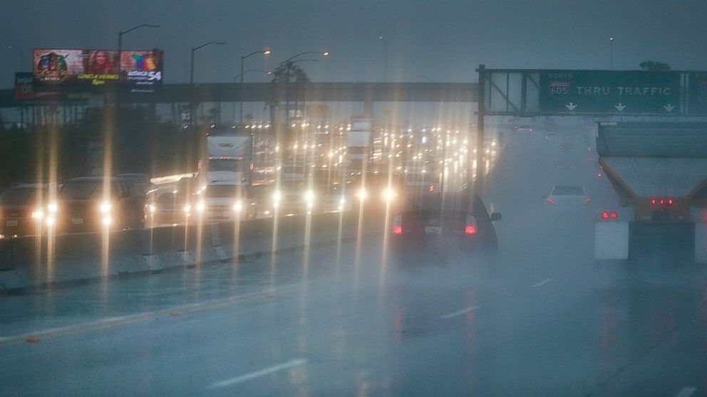 Heavy rain slows down motorists commuting on the 605 Freeway in Whittier, Calif. on March 7, 2016.