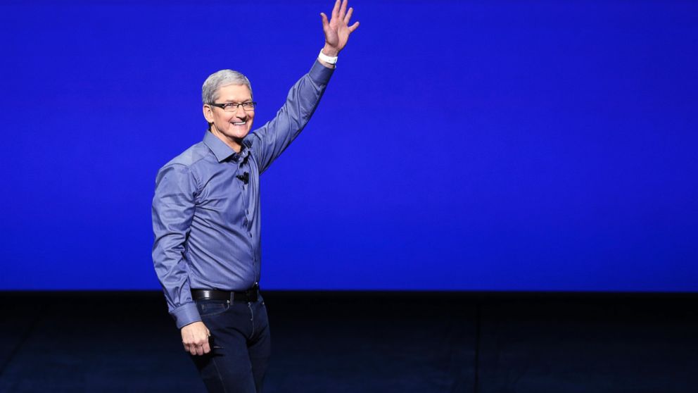 Tim Cook waves as he arrives on stage during an Apple Special Event on at Bill Graham Civic Auditorium Sept. 9, 2015 in San Francisco.