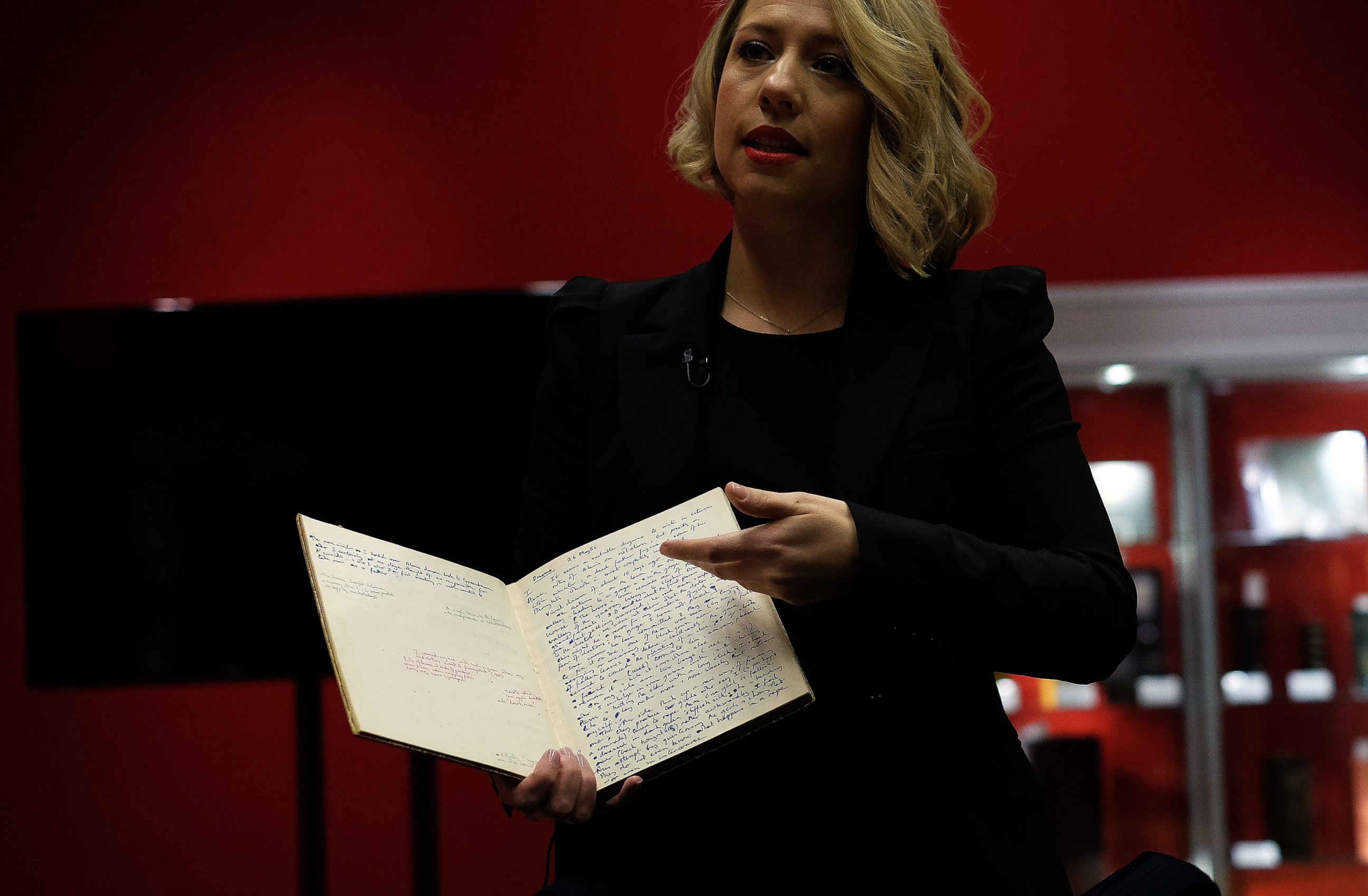 PHOTO: Bonhams' History of Science and Technology department director Cassandra Hatton shows a handwritten manuscript belonging to British mathematician Alan Turing in New York on April 9, 2015.