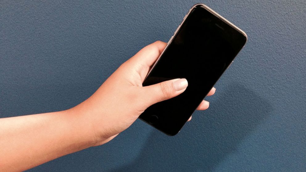 ABC’s Alexa Valiente holds her new 64 GB iPhone 6 in space gray.