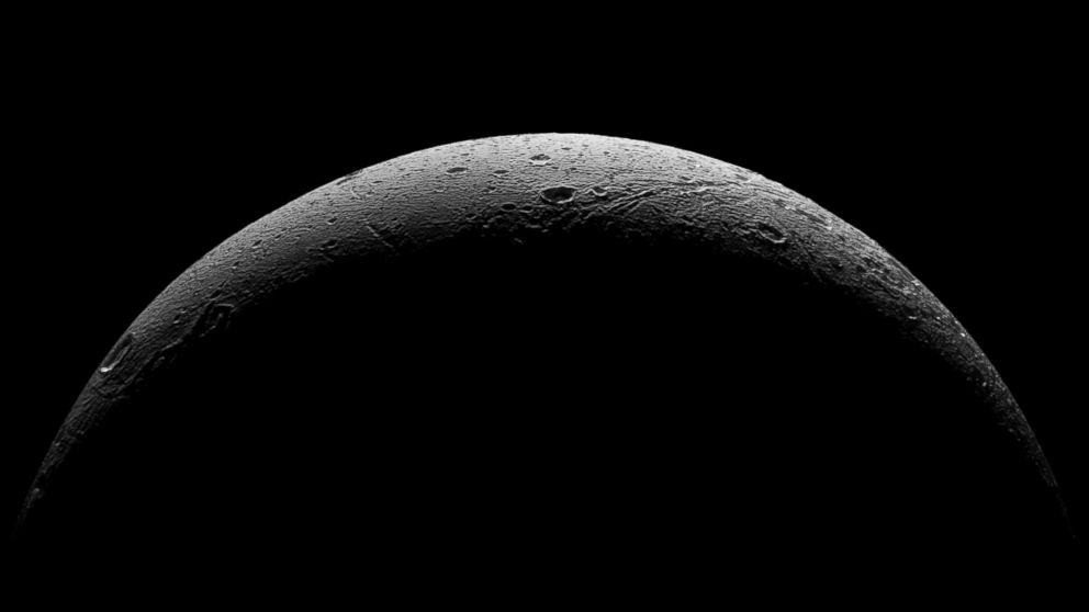 PHOTO: NASA's Cassini spacecraft captured this parting view showing the rough and icy crescent of Saturn's moon Dione following the spacecraft's last close flyby of the moon on Aug. 17, 2015.