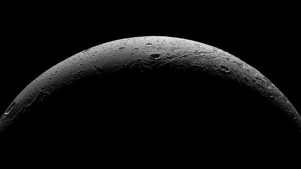 PHOTO: NASA's Cassini spacecraft captured this parting view showing the rough and icy crescent of Saturn's moon Dione following the spacecraft's last close flyby of the moon on Aug. 17, 2015.