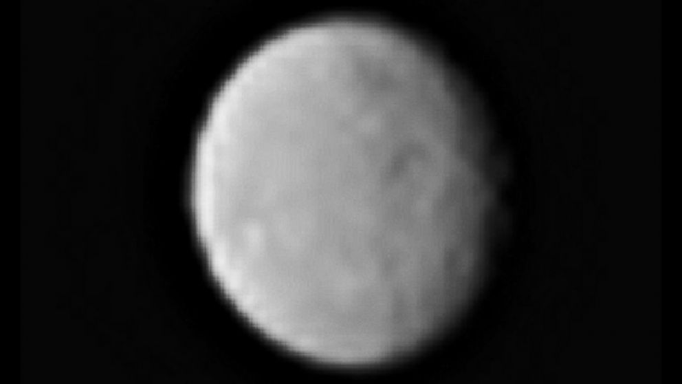 This processed image, taken on Jan. 13, 2015, shows the dwarf planet Ceres as seen from the Dawn spacecraft. The image hints at craters on the surface of Ceres. Dawn's framing camera took this image at 238,000 miles from Ceres.