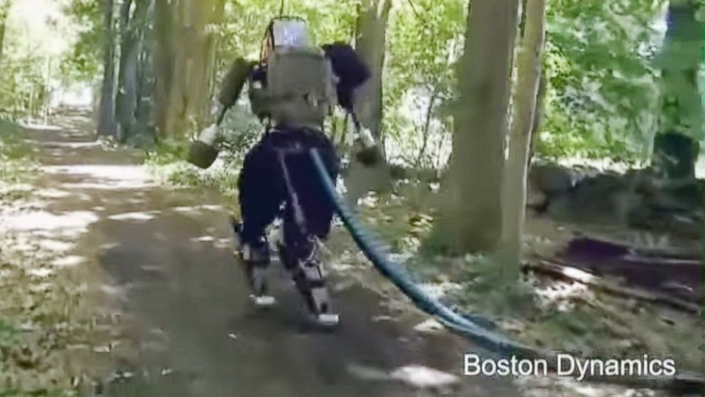 A humanoid robot under development at Boston Dynamics walks through the woods in a video called "Making Robots" posted to YouTube on Aug. 15, 2015.
