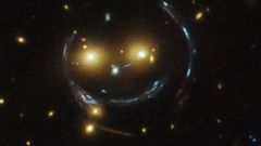 Galactic Smiley Face Captured by Hubble Telescope