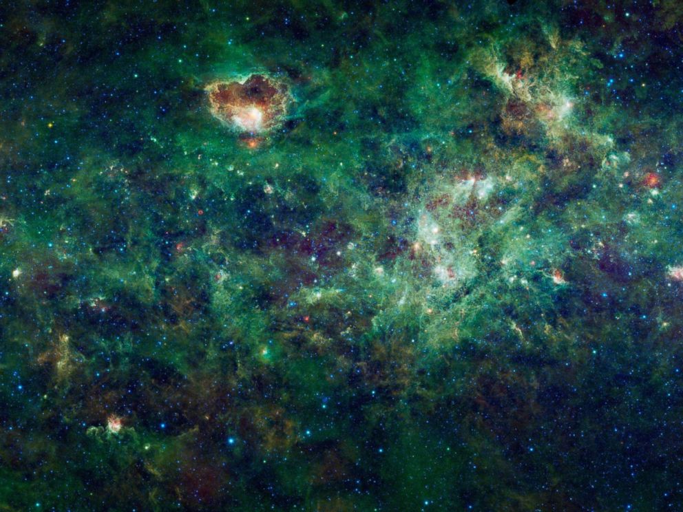 PHOTO: This enormous mosaic of the Milky Way galaxy from NASA's Wide-field Infrared Survey Explorer, or WISE, shows dozens of dense clouds, called nebulae. 