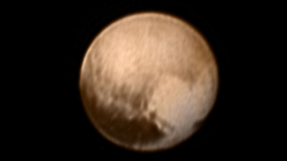PHOTO: This image of Pluto from New Horizons’ Long Range Reconnaissance Imager (LORRI) was received on July 8, 2015 and has been combined with lower-resolution color information from the Ralph instrument.