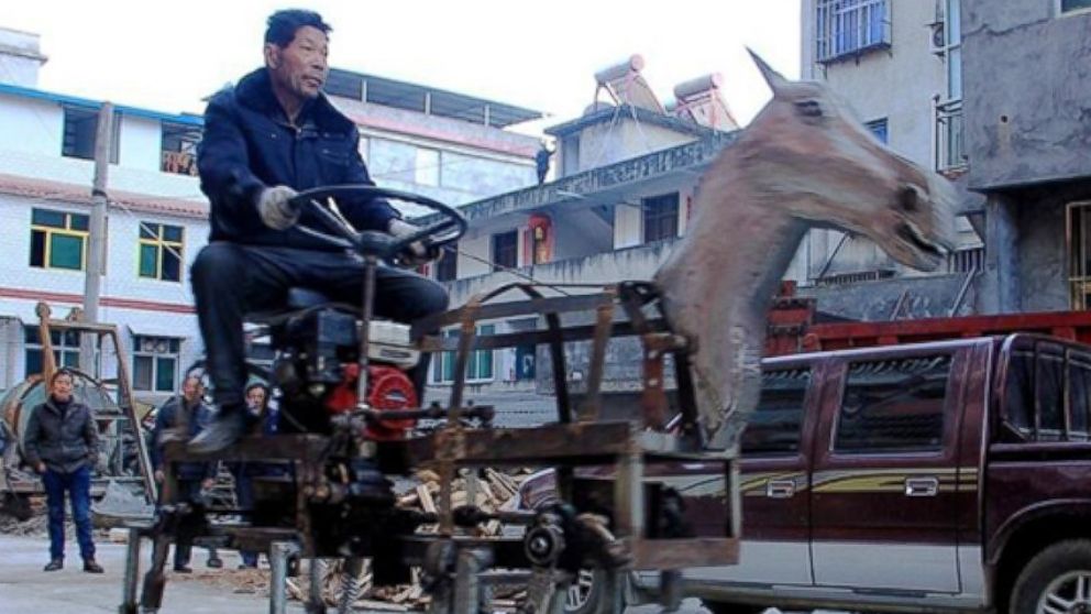 Chinese inventor Su Daocheng is pictured with his mechanical horse on Jan. 20, 2015. 

