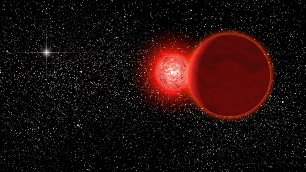 An artist's conception shows Scholz's star and its brown dwarf companion, foreground, during their flyby of our solar system that astronomers believe occurred 70,000 years ago.