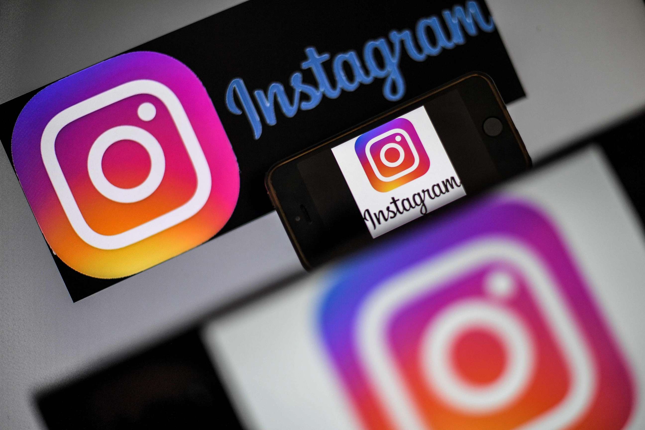 PHOTO: In this file photo taken on May 2, 2019, logos of U.S. social network Instagram are displayed on the screen of a smartphone in Nantes, western France. 