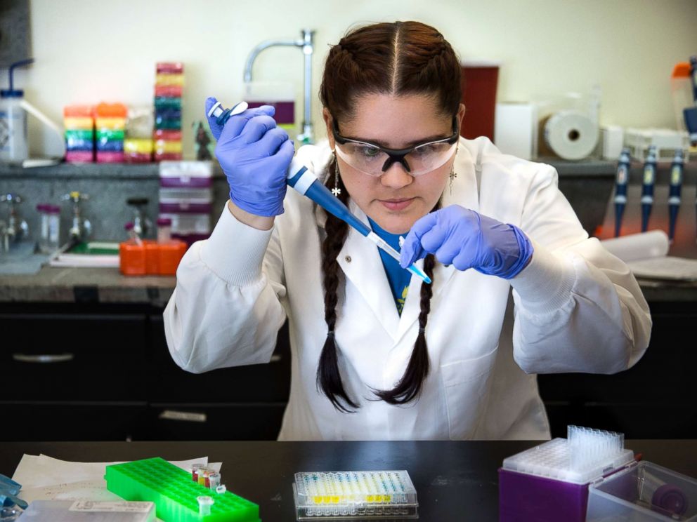 PHOTO: Graduate student, Juliana Agudelo, recreates a step in a blood sampling forensic method, June 2016.