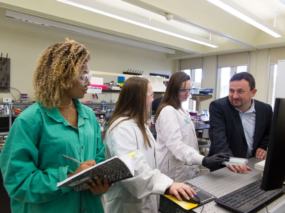 PHOTO: Assistant Professor Jan Halamek, Ph.D, working with Erica Brunelle, 4th year Chemistry PhD candidate; Mindy Hair, 2nd year Chemistry PhD candidate; and Adrianna Mathis 18 Chemistry, Nov. 2, 2017.