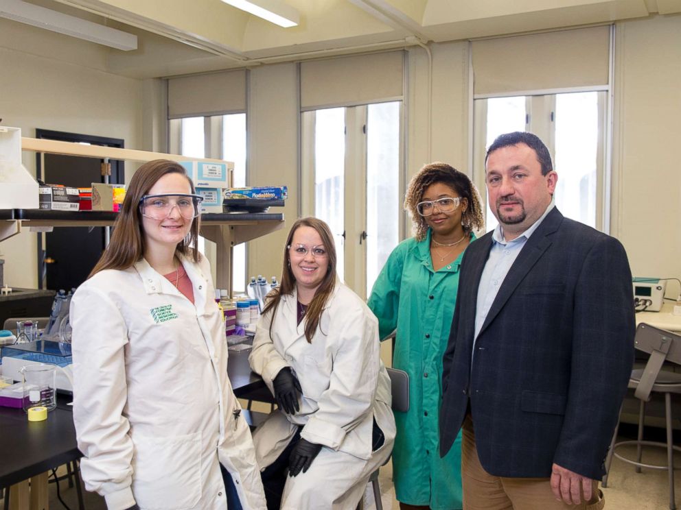 PHOTO: Assistant Professor Jan Halamek, Ph.D, working with Erica Brunelle, 4th year Chemistry PhD candidate; Mindy Hair, 2nd year Chemistry PhD candidate; and Adrianna Mathis 18 Chemistry, Nov. 2, 2017.