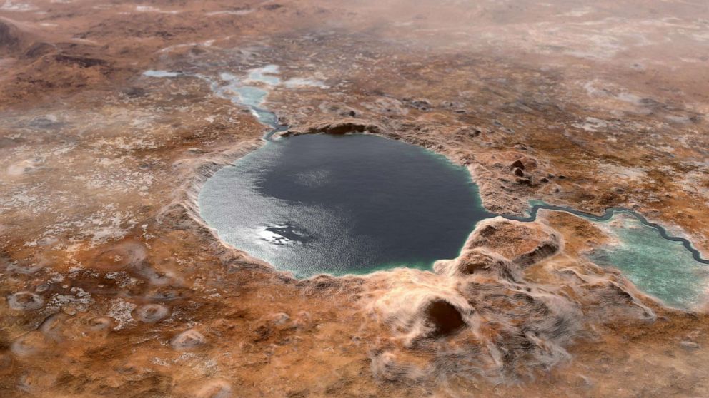 PHOTO: A NASA illustration shows Jezero Crater — the landing site of the Mars 2020 Perseverance rover — as it may have looked billions of years go on Mars, when it was a lake.