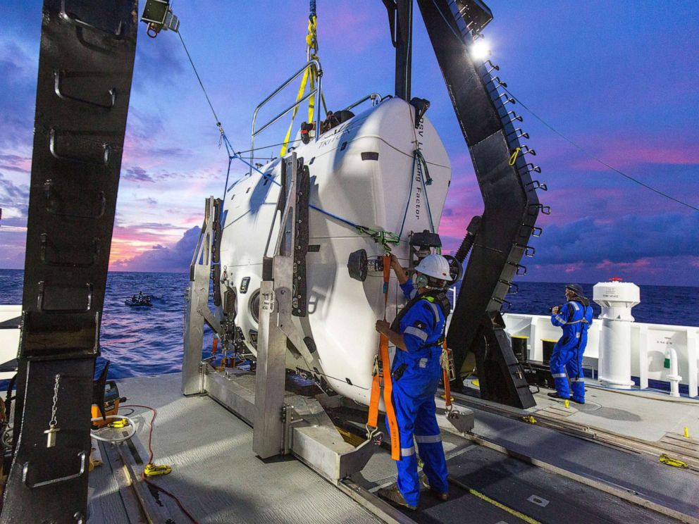 PHOTO: The submarine Limiting Factor is prepared at a drop point above the Mariana Trench.
