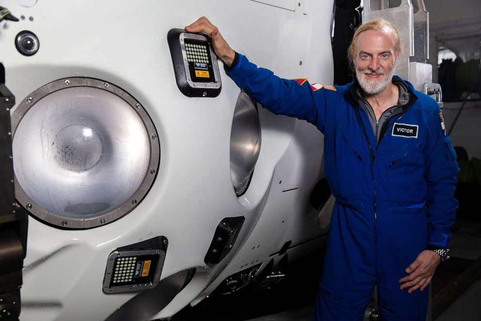 PHOTO: Victor Vescovo stands next to a submarine that he took to the deepest point on planet.