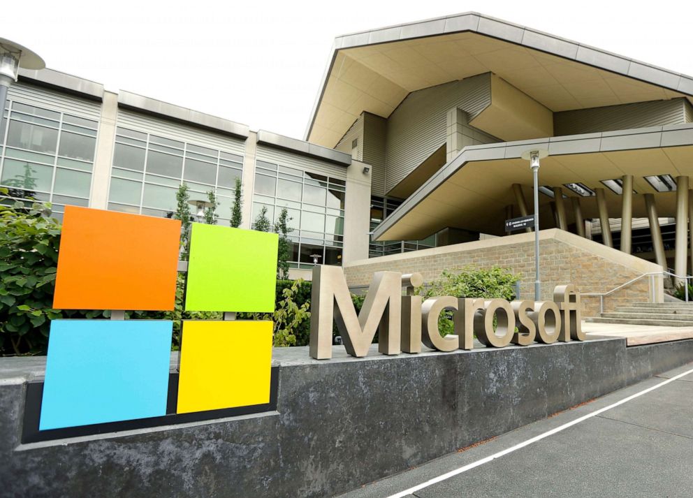 PHOTO: This July 3, 2014 file photo shows Microsoft Corp. signage outside the Microsoft Visitor Center in Redmond, Wash.