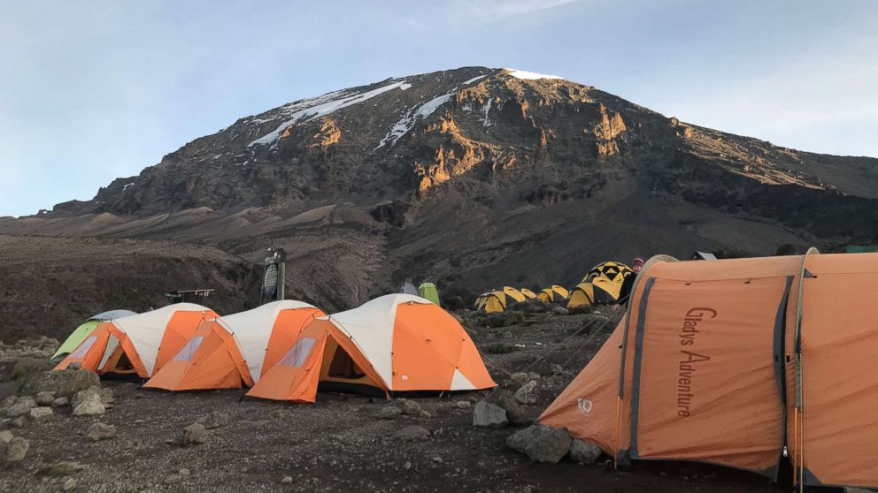 PHOTO: The peak of Mount Kilimanjaro is visible from Karanga Camp in Tanzania, February 2019.