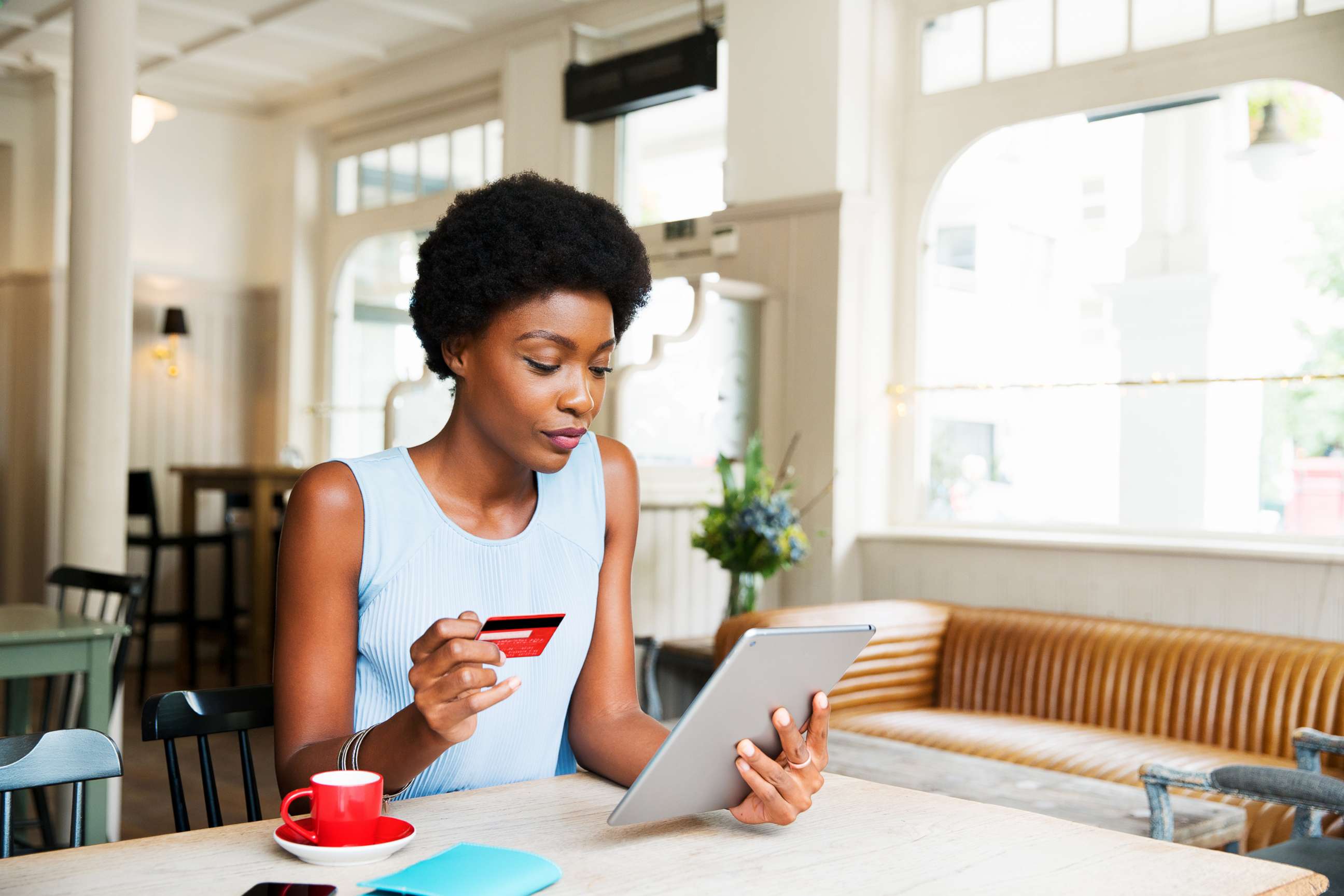 PHOTO: A woman is pictured doing online shopping with her tablet in this undated stock photo.
