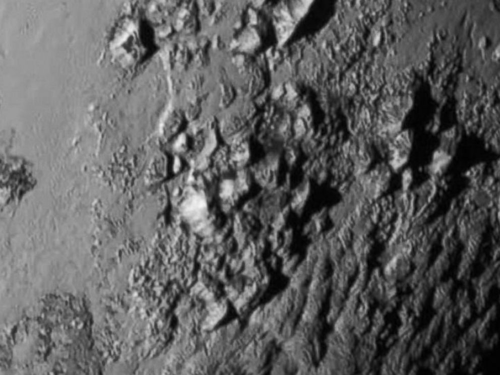 PHOTO: NASA’s New Horizons spacecraft captured this close-up image of a region near Pluto’s equator revealing a range of youthful mountains on July 14, 2015.