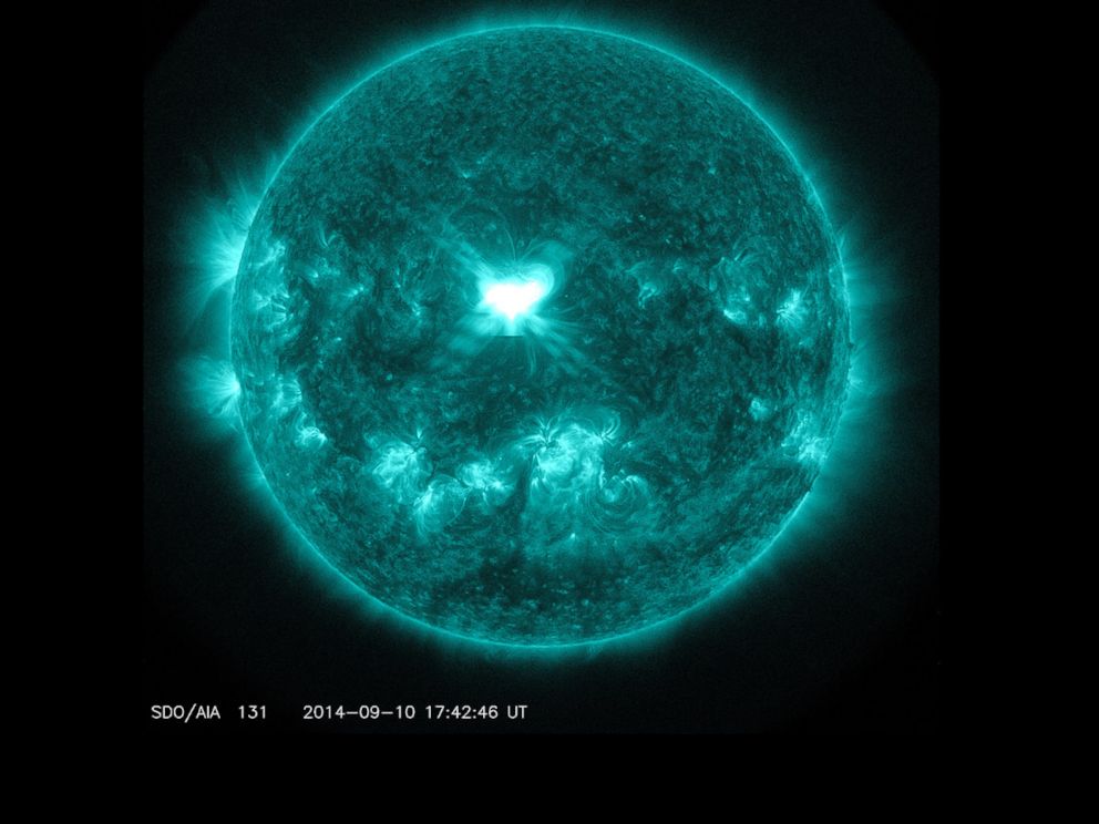 PHOTO: An X1.6 class solar flare flashes in the middle of the sun on Sept. 10, 2014. This image was captured by NASA's Solar Dynamics Observatory and shows light in the 131 Angstrom wavelength, which is typically colorized in teal.