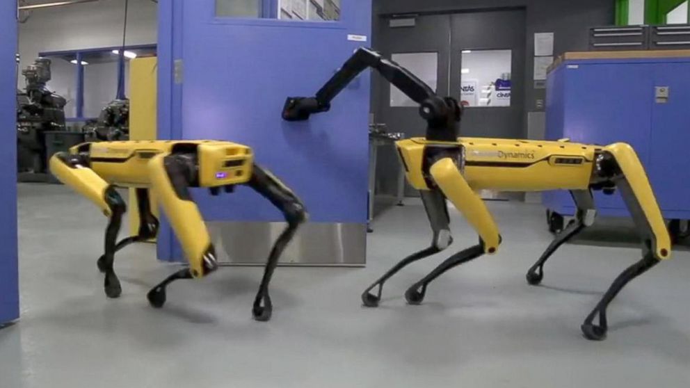 The SpotMini robot made by Boston Dynamics opens a door using an arm attachment in YouTube video.