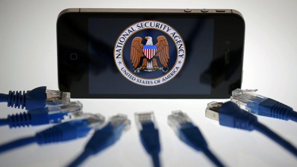 The logo of the National Security Agency is displayed on an iPhone in Berlin, June 7, 2013.