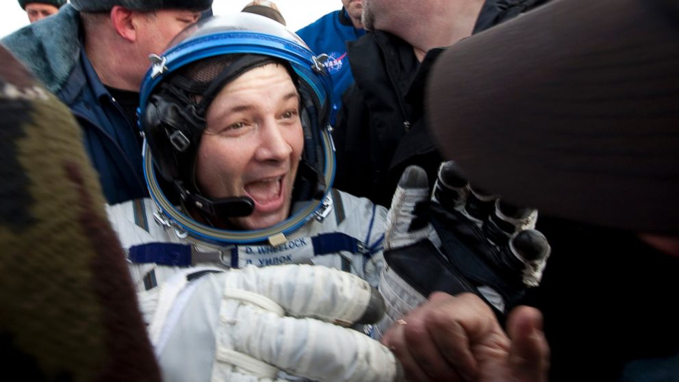 PHOTO: U.S. astronaut Douglas Wheelock reacts after landing near the town of Arkalyk in northern Kazakhstan Nov. 26, 2010.