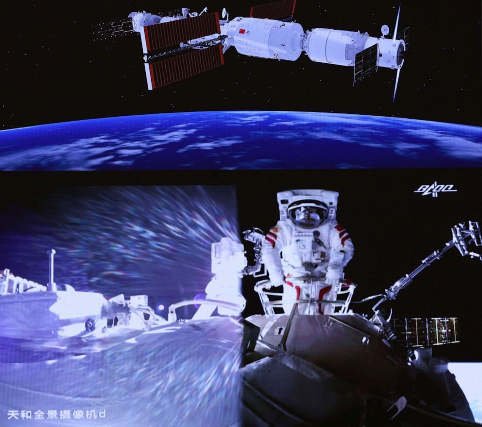 PHOTO: Chinese astronaut Liu Boming conducts extravehicular activities out of the space station core module Tianhe at Beijing Aerospace Control Center, on July 4, 2021.