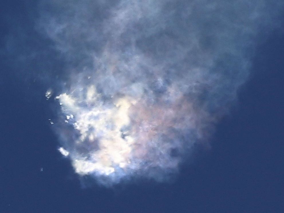 PHOTO: A SpaceX Falcon 9 rocket on its seventh official commercial refueling mission to the International Space Station in orbit is broken, on June 28, 2015, minutes after being launched from Cape Canaveral Air Force Station in Florida.