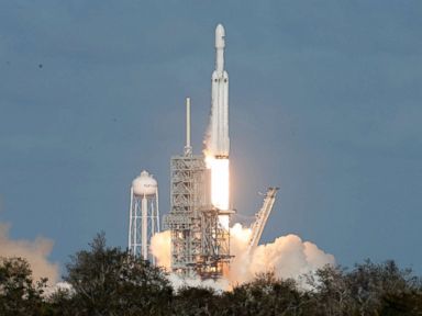 Elon Musk's SpaceX launches megarocket with his own Tesla on board