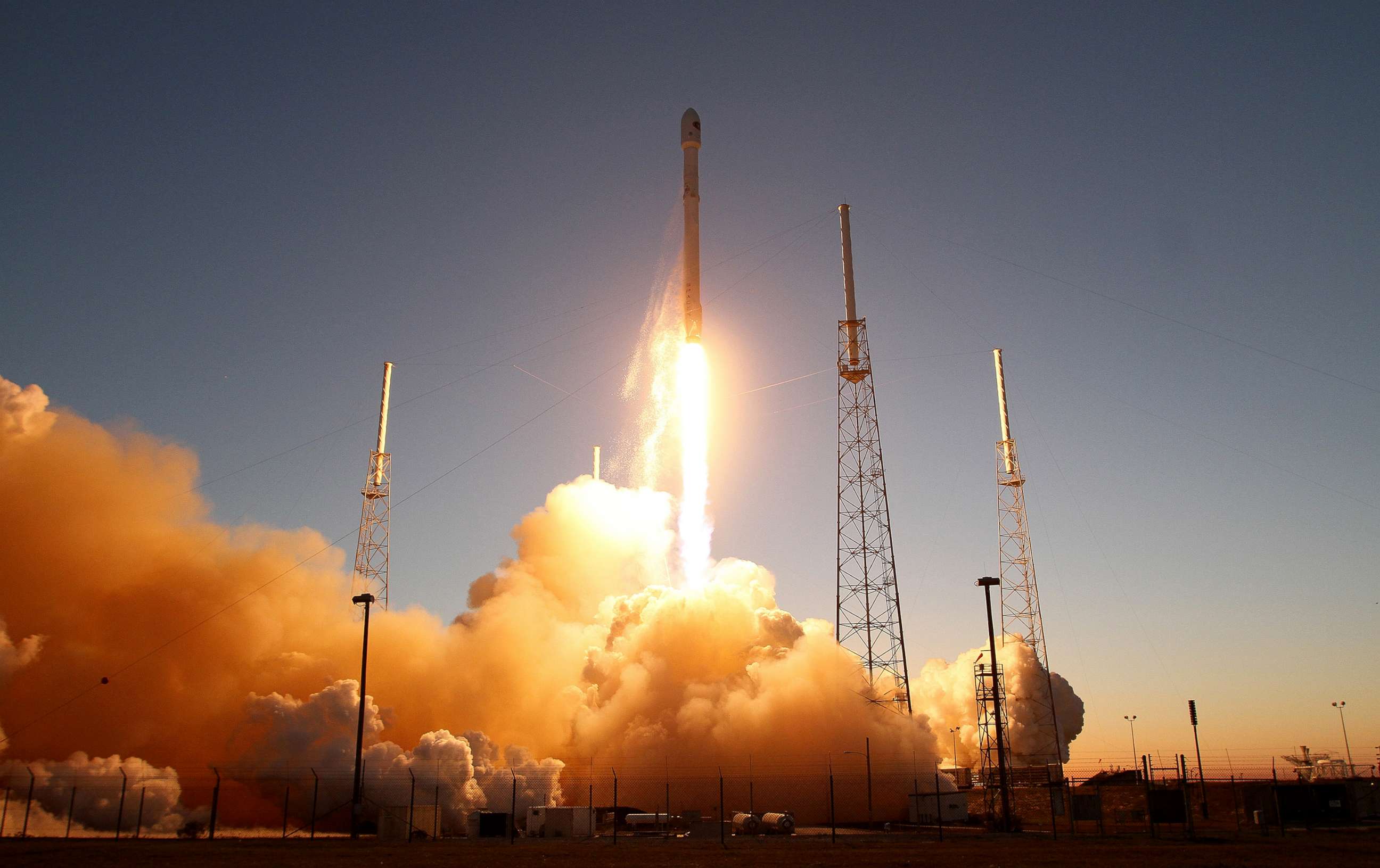PHOTO: A SpaceX Falcon9 rocket blasts off the launch pad, Feb. 11, 2015, carrying the NOAA's Deep Space Climate Observatory spacecraft.