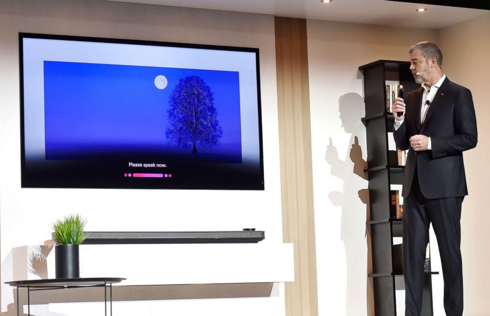 PHOTO: LG Electronics U.S.A. Vice President of Marketing David VanderWaal shows features of the LG AI Signature OLED television during a LG press event for CES 2018 in Las Vegas, Jan. 8, 2018.