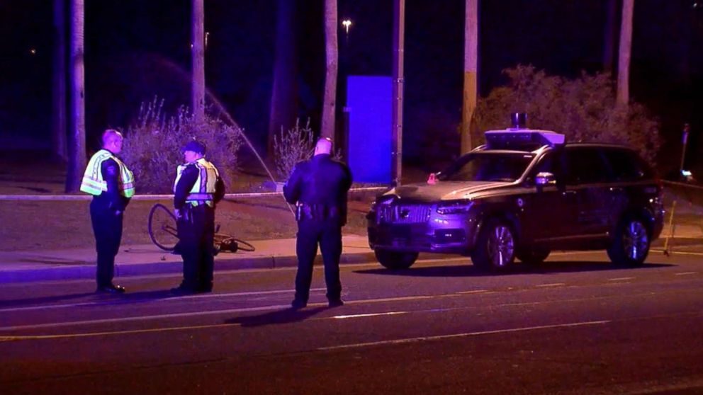 PHOTO: Phoenix police investigate the scene where an Uber self-driving vehicle struck a woman in Tempe, Ariz., March 19, 2018.