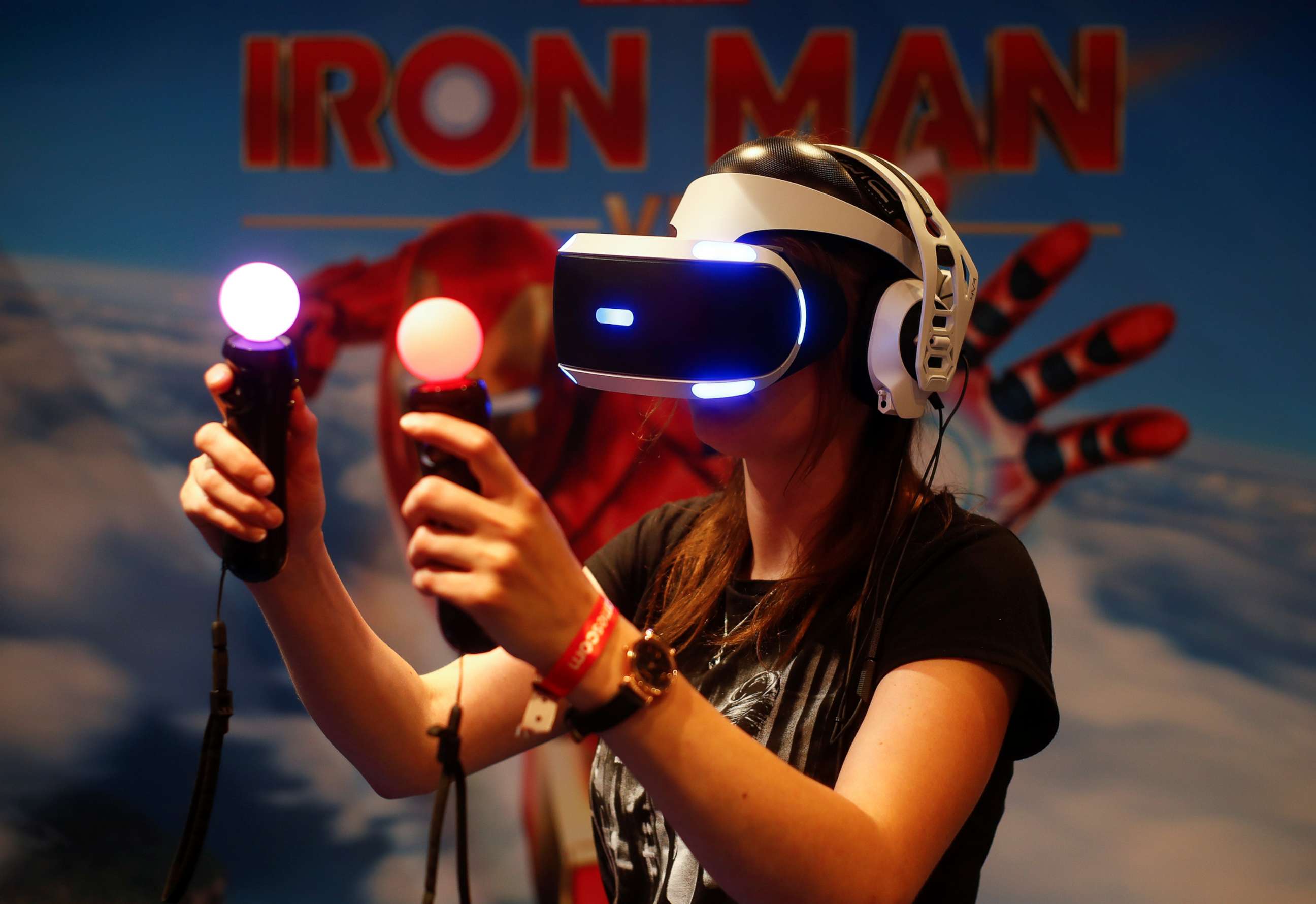 PHOTO: A gamer plays on a Playstation VR with virtual reality goggles and two controllers during Europe's leading digital games fair Gamescom, which showcases the latest trends of the computer gaming scene in Cologne, Germany, August 21, 2019.
