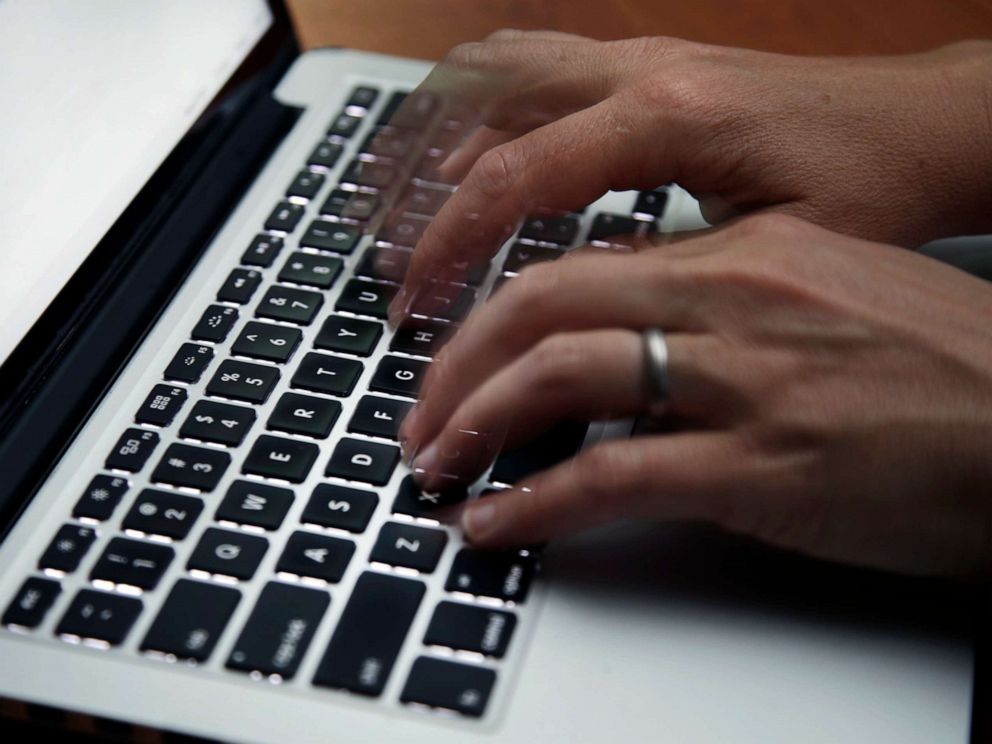 PHOTO: A person works on a laptop in North Andover, Mass., June 19, 2017.